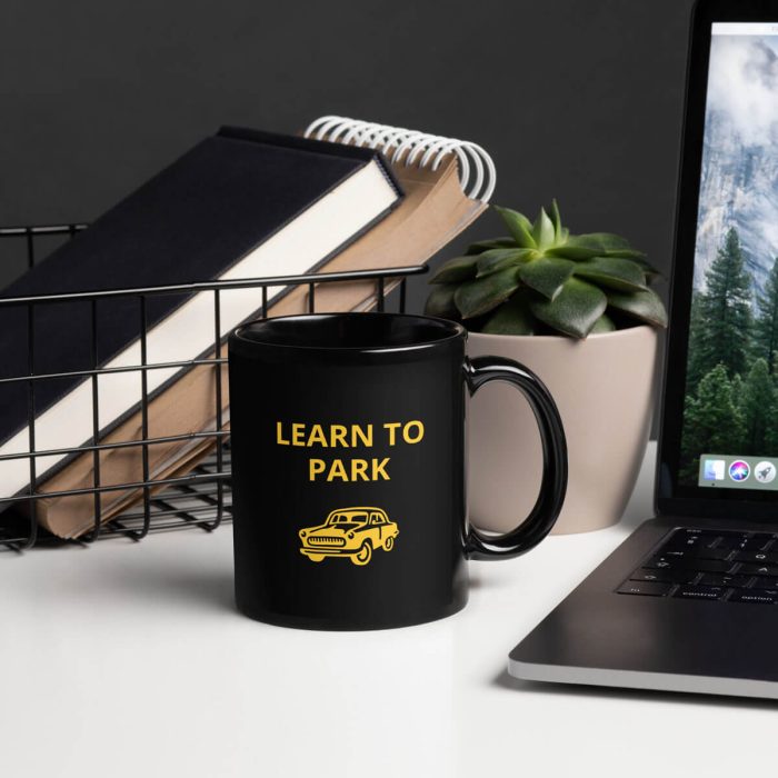 learn to park mug, laptop background